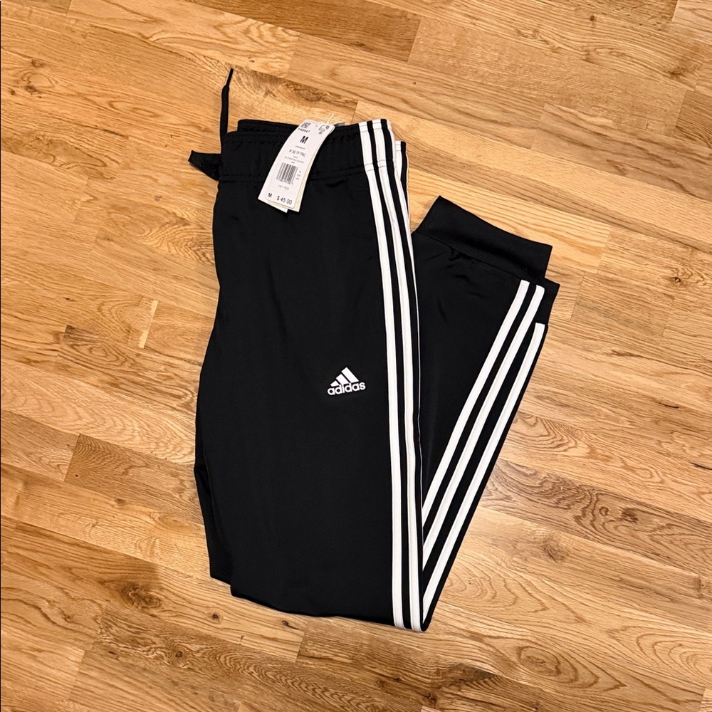 Adidas womens Black Joggers with White Stripes